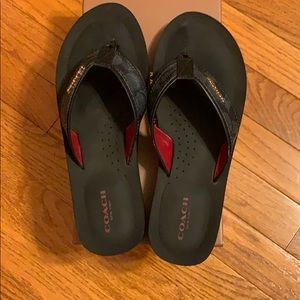 Black Coach flip flops . Perfect condition